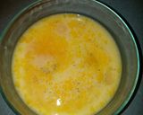 A picture of step 2 of Sausage biscuits eggs casserole.