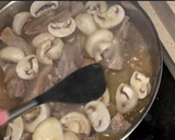 Foto del paso 7 de la receta: Secreto de cerdo a la cerveza (con champiñones)