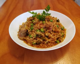 Foto del paso 8 de la receta: Arroz con pollo y costillas de cerdo con guisantes de la huerta