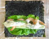 A picture of step 6 of California Rolls (perfect for guests).