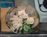 A picture of step 2 of Tofu and Cucumber Salad with Umeboshi-Sesame Dressing.