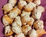 Foto del passaggio 6 della ricetta Fritole con pinoli, uvetta, grappa e profumo d'arancia