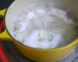 A picture of step 1 of Miso Milk Soup with Maitake Mushrooms, Satoimo (Taro Root), and Pea Shoots.