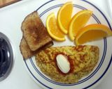 A picture of step 7 of Swiss Cheese and Dill Omelet.