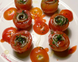 Foto del paso 4 de la receta: Cherrys rellenos de anchoas caseras, con un punto de picante y albahaca