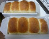 A picture of step 9 of Simple Fluffy Mini Bread Loaves Using a Pound Cake Pan.