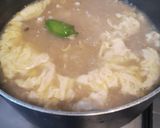 A picture of step 3 of Chicken corn soup.