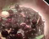 A picture of step 4 of Pork Chops With Ginger Cherry Sauce.