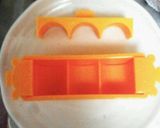 A picture of step 1 of Character Bento Anpanman and Baikinman.