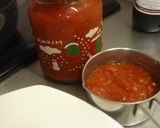 A picture of step 10 of Herb Breaded Chicken Breast Served in Tomato Sauce.