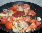 A picture of step 2 of Chicken In Tomato Soup / Sopa Espanola.