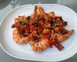 Une image de l'étape 12 de Gambas sauvages géantes marinées aux tomates, ail, citron et coriandre.
