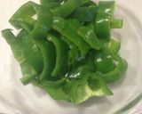 A picture of step 2 of Done in 3 Minutes! Green Bell Peppers with Bonito Flakes.