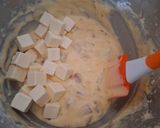 Une image de l'étape 2 de Cake tomate confite vache qui rit.