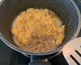 A picture of step 5 of Fried three layers pork.
