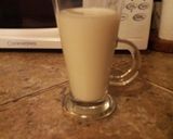 A picture of step 9 of A 'latte' the old fashioned way with smooth caramel sauce and hand made white chocolate chunks.