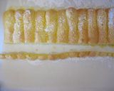 A picture of step 16 of Peach Bavarois Charlotte Cake.