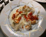 Une image de l'étape 11 de Filets de dorade aux crevettes sauvages, tomates cerises, aneth et citron vert.