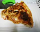 A picture of step 10 of Chicken fajitas pizza.