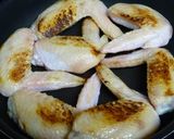 A picture of step 1 of Chinese-Style Simmered Chicken Wings and Daikon Radish with Star Anise In a Pressure Cooker.