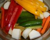 A picture of step 2 of Easy Microwaved Pickles.