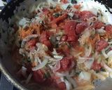Foto del paso 2 de la receta: Empanadas de cebolla, tomate, queso y huevo