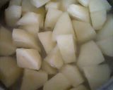A picture of step 1 of Cream Cheese and Potatoes Wrapped in Cured Ham Christmas Wreath.