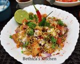 A picture of step 8 of Samosa Chaat.