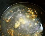 A picture of step 2 of Garlic khichri.