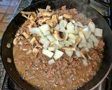 A picture of step 4 of Cheesy Potato Mushroom Burger Bake.