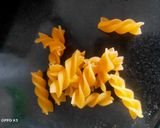 A picture of step 1 of Italian white sauce pasta.