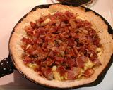 A picture of step 5 of Deep dish breakfast pizza.