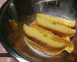A picture of step 3 of French Toast Sticks with Bread Crusts.