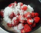 A picture of step 2 of Easy Whole Strawberry Preserves.
