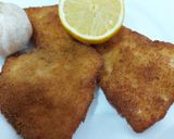 Foto del paso 5 de la receta: Filetes de pollo empanados y aliñados con ajo y limón🍋