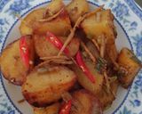 Hình bước làm 8 của món Khoai tây um gừng