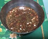 Une image de l'étape 9 de Marinade épicée au vin rouge, tomates et herbes aromatiques.