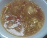 A picture of step 7 of Egg, Tomato, and Malony Noodle Soup.