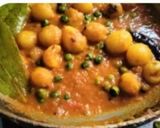 A picture of step 3 of Spiced baby potato curry with tomato.
