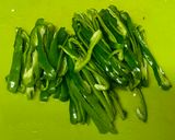 A picture of step 1 of Japanese Sweet Green Pepper Fry.