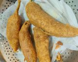 A picture of step 8 of Stuffed Paneer Mirch bhajiya and baingan bhajiya.