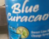 A picture of step 2 of Blue lagoon mojito.