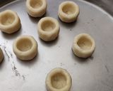 A picture of step 5 of Kaju chocolate cups.