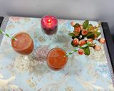 A picture of step 2 of Orange and carrot juice.