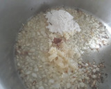 Foto del paso 3 de la receta: Guiso de calamar con almejas y alcachofas