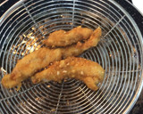 Foto del paso 7 de la receta: Palitos de pechuga de pollo a la naranja y canela (sin gluten)