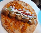 A picture of step 2 of Chicken Ball n sausage Pita roll.