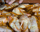 Foto del paso 5 de la receta: Alitas de pollo a la naranja