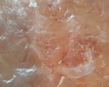 A picture of step 1 of Chicken Schnitzel.