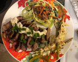 A picture of step 8 of Seared Ribeye, Cheesy Baked Asparagus, with Zoodle Medley.
